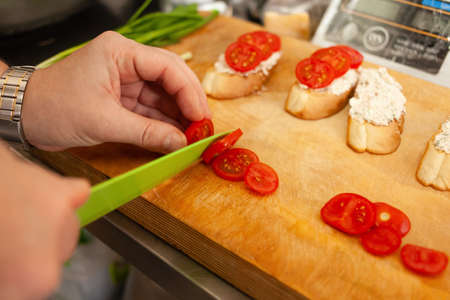 Bruschetta with tomatoes, Philadelphia cheese, smoked sausage, dill and olive oil.