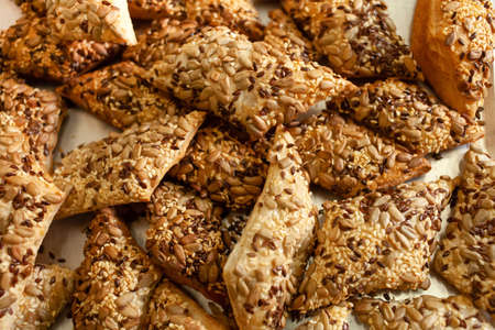 Baking with seeds, herbs and seeds on a tin trayの写真素材