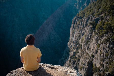 Man embracing Turkey's mountainous trails, reveling in the adventure of alpine travel.