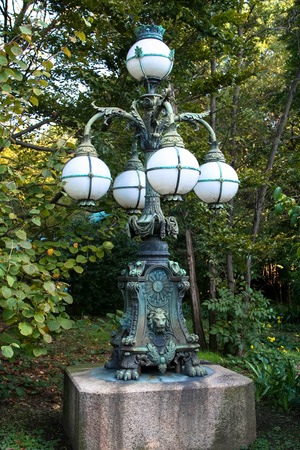 Old european styled lantern in the gardenの写真素材