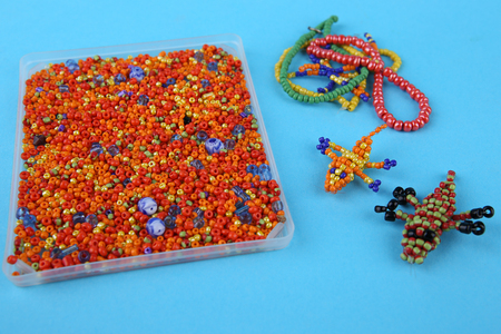 Beads and bead crocodilesの写真素材