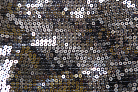 Mirror spangles background. Shiny mirrored fashion fabric.の写真素材