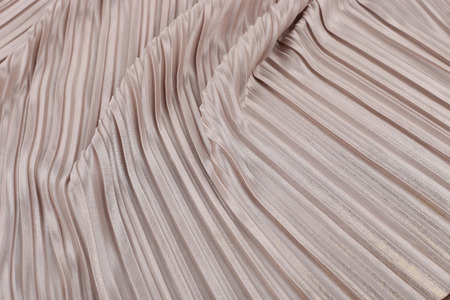 Soft pink pleated fabric. Plisse fabric texture  background.の写真素材