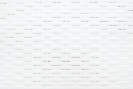 White woven pattern background. Plastic woven ornament surface.の写真素材