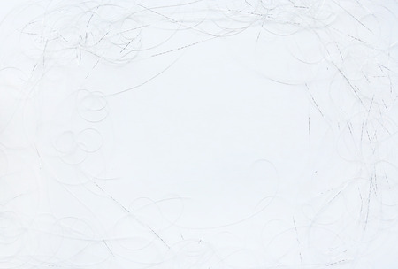 Abstract white silver thread pattern like frame. Background with abstract graphic line of silver white thread with empty place.の写真素材