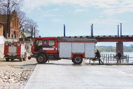 Kaunas, Lithuania â€“ April 25, 2019: Fire brigade  during an emergency exercise. Firefighters...