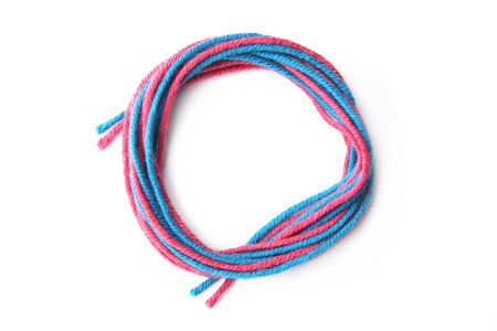 Colorful circle frame made of thread isolated on white background. Empty frame of cotton thread.