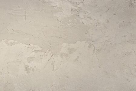 Wet plaster pattern background. Abstract grunge stucco texture.の写真素材