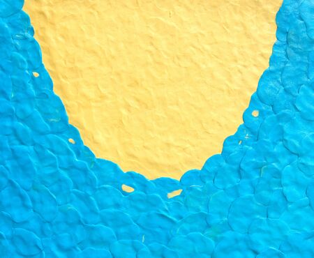 Blue yellow plasticine texture background. Sea and sand concept, top view. Modeling clay material pattern. Beach concept.の写真素材