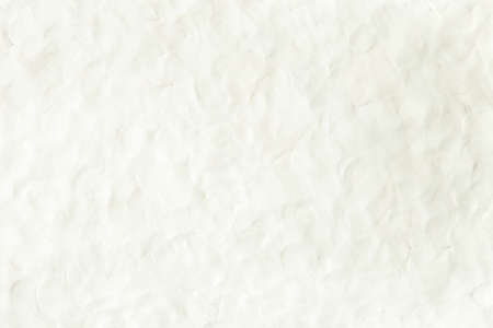 White plasticine texture with finger prints. Modeling clay material pattern background.の写真素材