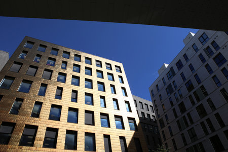 Oslo, Norway - June 28, 2022: Buildings in Barcode Project area  in Oslo downtown. Building covered by copper tiles. Modern business  offices buildings in Bjorvika district, Oslo.の写真素材