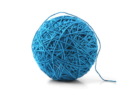 Blue big thread ball isolated on white background. Ball of natural cotton string.