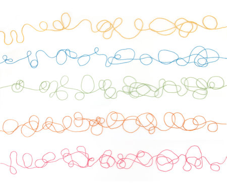 Tangled colorful cotton threads isolated on white background. Abstract thread lines pattern.