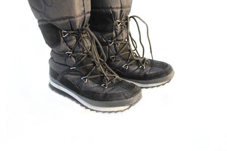 a pair of  snow boots on white background