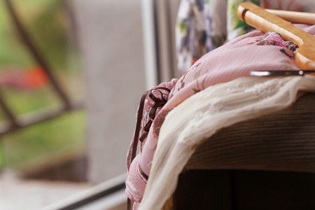 Heap of clothes on chair