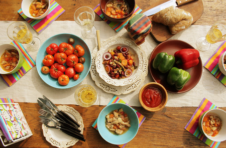 Rustic dining table, friendly place setting