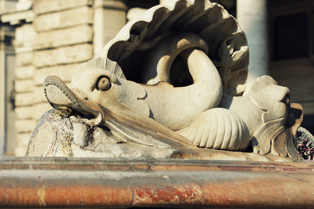 The fountain in the piazza Colonna Rome, Italyの写真素材