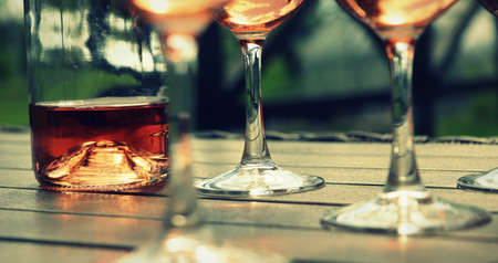 Composition with rose wine glasses , dark backgound .の写真素材