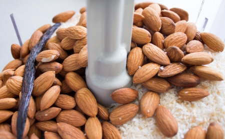 Making almond coconut butter in food processorの写真素材