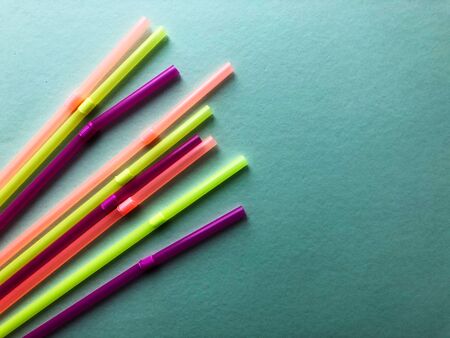 Single-use plastic straws in trendy blue colour.の写真素材