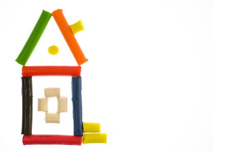 The child has made drawing from plasticine on a white backgroundの写真素材