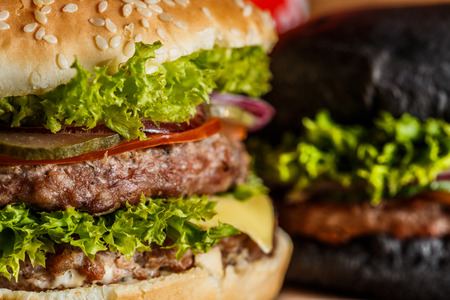 Delicious hamburger on wooden backgroundの写真素材
