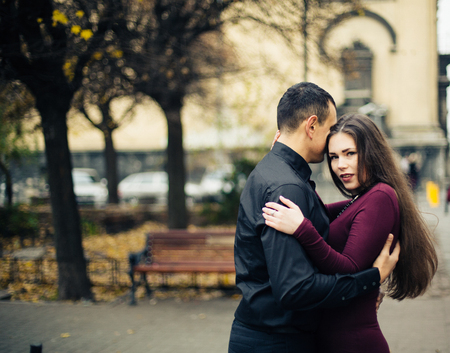 happy couple posing in  cityの写真素材