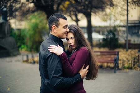 happy couple posing in  cityの写真素材
