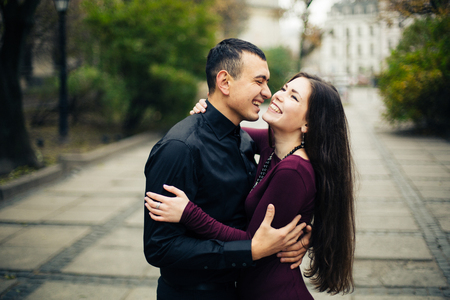 happy couple posing in  cityの写真素材