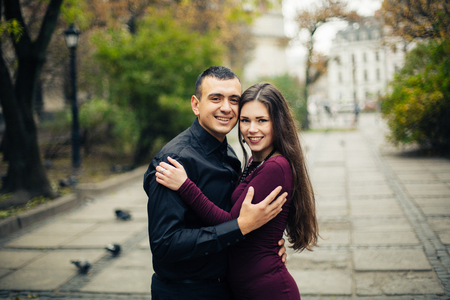 happy couple posing in  cityの写真素材