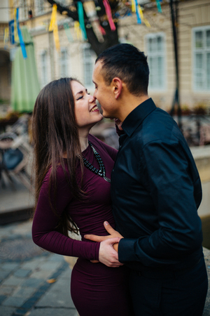 happy couple posing in  cityの写真素材