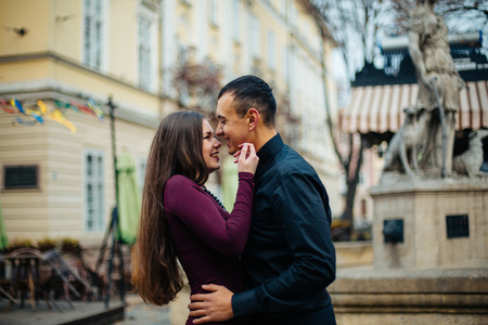 happy couple posing in  cityの写真素材