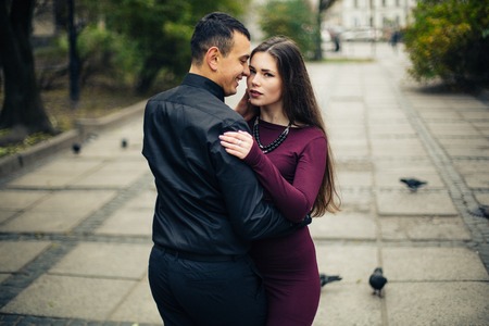 happy couple posing in  cityの写真素材