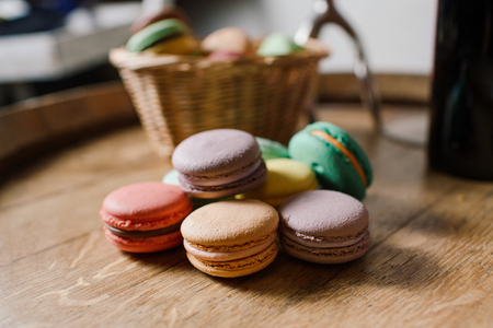 vivid color macaroons on wooden tableの写真素材