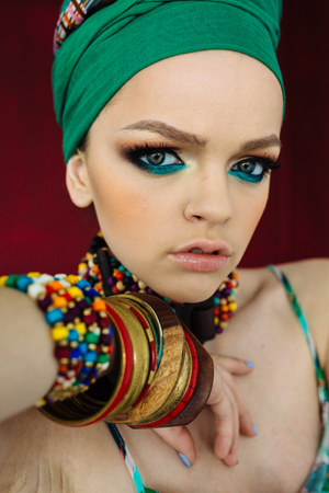 Photo of girl with large accessories in African styleの写真素材