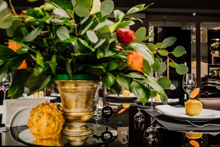 Table served for Christmas dinner in living room, close up viewの写真素材