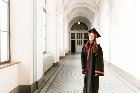 Portrait of graduating student girl of the universityの写真素材