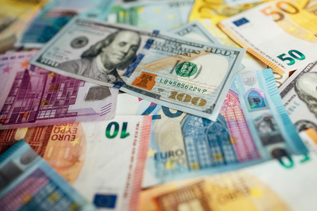 Euro and USA dollar money banknotes background, wealth conceptの写真素材