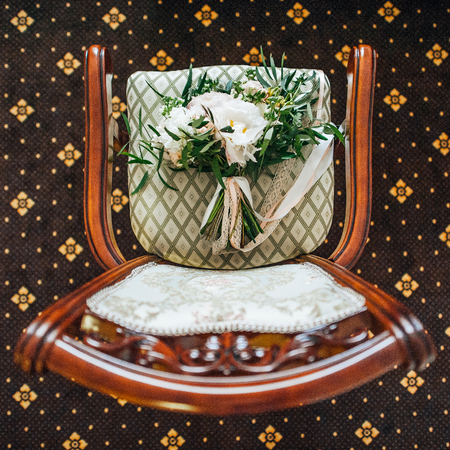 beautiful brides bouquet on the chairの写真素材