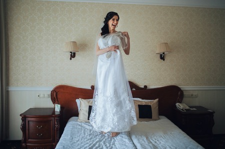 The beautiful bride in the morning dresses for a wedding ceremonの写真素材