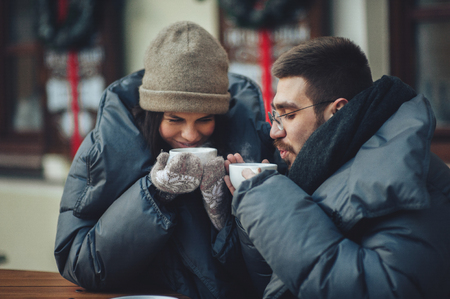 Couple drinking tea in the cafeの写真素材