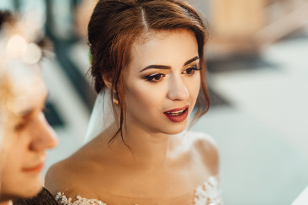 stylish luxury red haired bride and elegant groomの写真素材