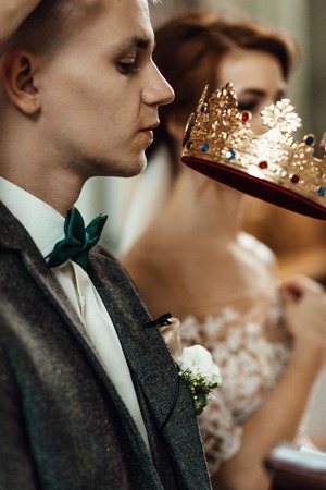 stylish luxury red haired bride and elegant groom