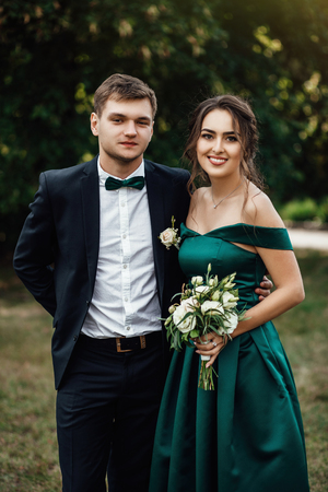 portrait of a young beautiful couple hugged togetherの写真素材