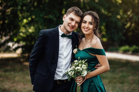 portrait of a young beautiful couple hugged togetherの写真素材