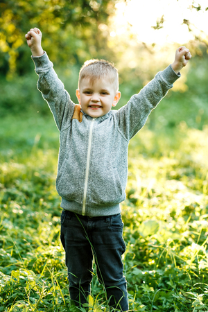 Little young caucasian boy in nature, childhoodの写真素材