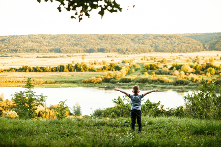 Little young caucasian boy in nature, childhoodの写真素材
