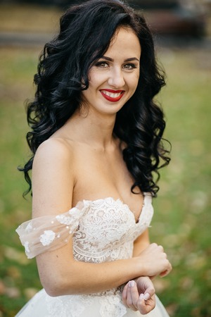 Beautiful bride in elegant white dress  posingの写真素材
