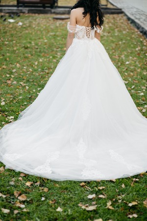 Beautiful bride in elegant white dress  posingの写真素材
