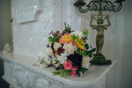 Wedding bouquet of pink and white roses and blue fresiaの写真素材